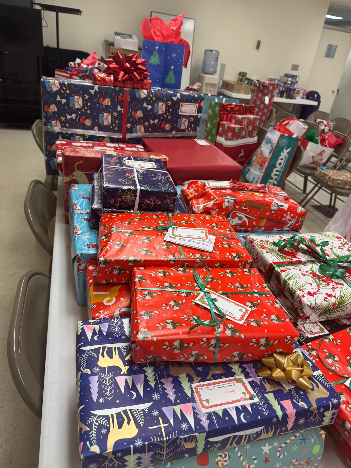 Read more about the article The Adopt-A-Family Gifts Are Piling Up!